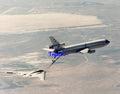 10X8 Colour Photo Northrop B-2 In close proximity of a KC-10 Extender