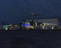 10X8 Colour Photo Boeing C-17 Globemaster being prepared for a night flight