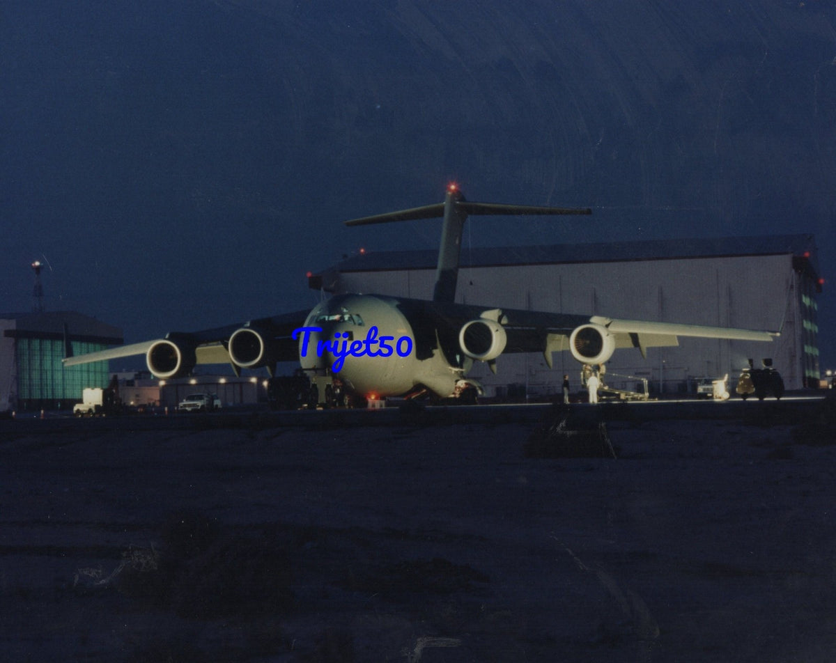 10X8 Colour Photo Boeing C-17 Globemaster being prepared for a night flight