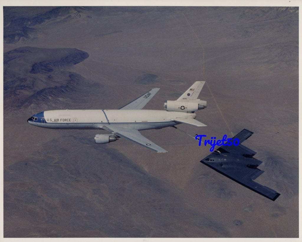 10X8 Colour Photo Northrop B-2 In flight refuelling with a KC-10 Extender