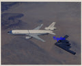 10X8 Colour Photo Northrop B-2 In flight refuelling with a KC-10 Extender